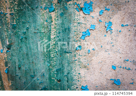 Old cracked paint. Grunge texture. Layer of old paint cracked. Old cracked paint. Grunge texture. Layer of old paint cracked. 114745394