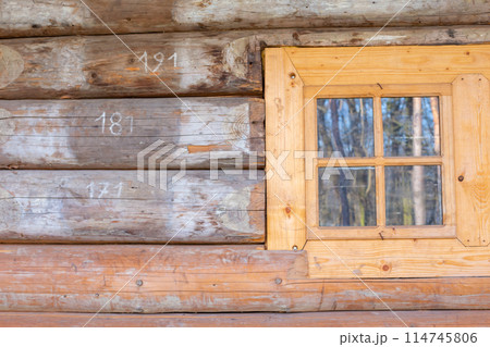 old wooden house, old windows, old building. wooden roof shingle old wooden house, old windows, old building. wooden roof shingle 114745806