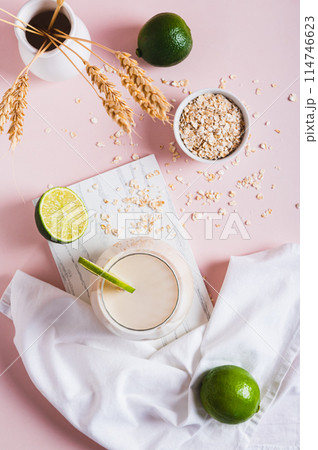 Oatzempic drink for weight loss made from oatmeal, water and lime in a glass top and vertical view Oatzempic drink for weight loss made from oatmeal, water and lime in a glass top and vertical view 114746623