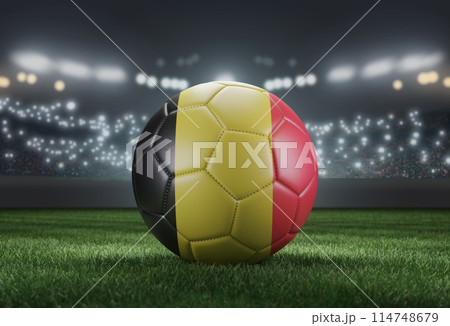 Soccer ball in flag colors on a bright blurred stadium background. Belgium. 3D image 114748679
