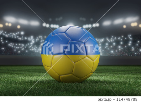 Soccer ball in flag colors on a bright blurred stadium background. Ukraine. 3D image Soccer ball in flag colors on a bright blurred stadium background. Ukraine. 3D image 114748789