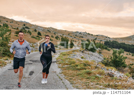 A Couple's Energizing Morning Run in the Mountains A Couple's Energizing Morning Run in the Mountains 114751104