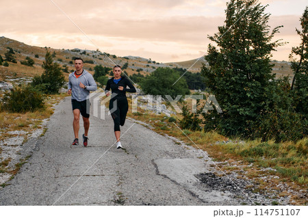 A Couple's Energizing Morning Run in the Mountains A Couple's Energizing Morning Run in the Mountains 114751107