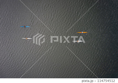 Kayaking top view. Group of kayaks rowing. Aerial view from drone. 114754512