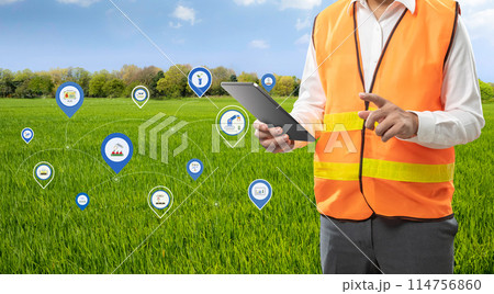 Agricultural engineer or farmer work with tablet in farm Agricultural engineer or farmer work with tablet in farm 114756860