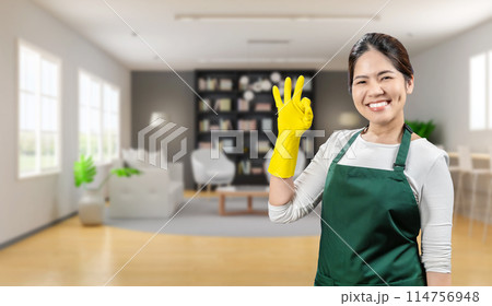 Asian housekeeper wear gloves apron Asian housekeeper wear gloves apron 114756948