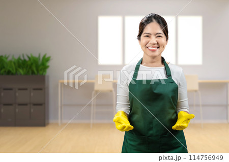 Asian housekeeper wear gloves apron Asian housekeeper wear gloves apron 114756949