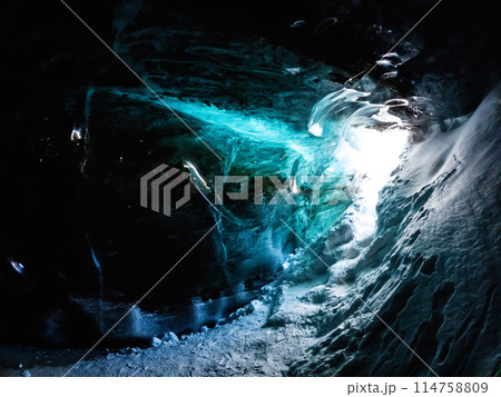 Glacial Grotto: A Frozen Marvel in the Tian Shan Mountains of Central Asia. Glacial Grotto: A Frozen Marvel in the Tian Shan Mountains of Central Asia. 114758809