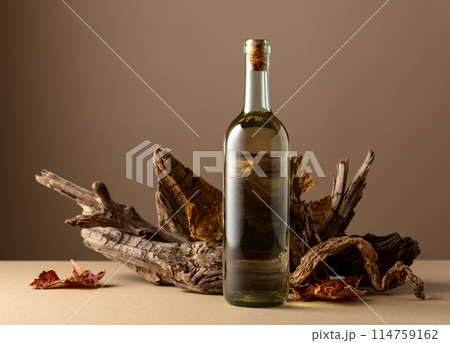 White wine and snags on a beige background. 114759162
