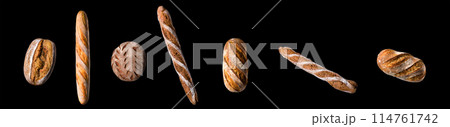 Set of fresh baked bread and French rye baguette isolated on black background Set of fresh baked bread and French rye baguette isolated on black background 114761742