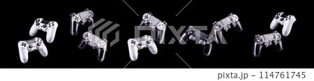 Set of video game joysticks gamepad isolated on a black background 114761745