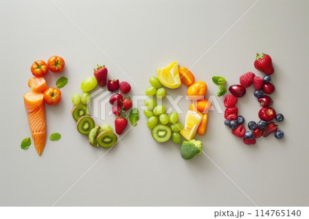 Colorful Fruit Alphabet Display on Textured Background 114765140