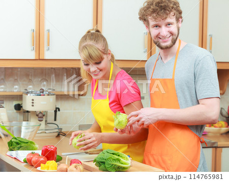 Couple preparing fresh vegetables food salad 114765981
