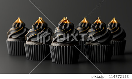 Row chocolate cupcakes with black frosting golden pearls on dark background, minimalism, copy space 114772138