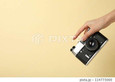 Retro camera, photo shooting on retro camera Retro camera, photo shooting on retro camera 114773000