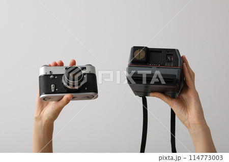 Retro cameras, shooting on retro cameras concept 114773003
