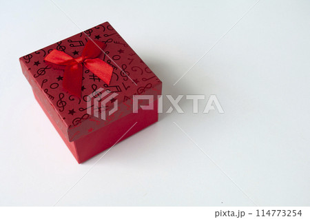Red color present on white background with customizable space for text. Copy space and celebration. 114773254