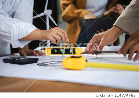 Engineer teams meeting working together working technology and business, Renewable energy-based green businesses and global warming.. Engineer teams meeting working together working technology and business, Renewable energy-based green businesses and global warming.. 114774468