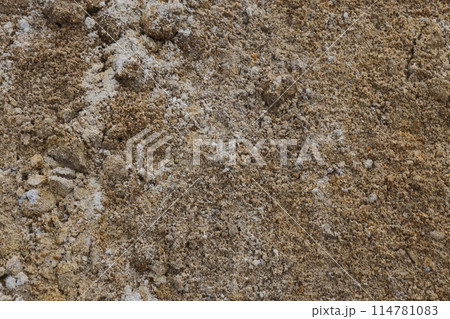 Surface structure of river sand. Large river sand at a construction site. Surface structure of river sand. Large river sand at a construction site. 114781083