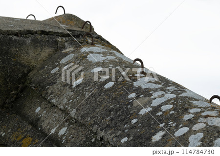 Normandy France D-Day stronghold bunker at Utah beach area with iron holds. WWII Utah Beach. Veterans Day rememberance. High quality photograph Normandy France D-Day stronghold bunker at Utah beach area with iron holds. WWII Utah Beach. Veterans Day rememberance. High quality photograph 114784730