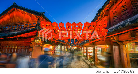 Lijiang old town in the evening with crowd tourist , Yunnan China. Lijiang old town in the evening with crowd tourist , Yunnan China. 114789368