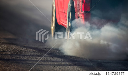 Air pollution from diesel vehicle exhaust pipe on road Air pollution from diesel vehicle exhaust pipe on road 114789375