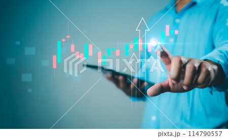Businessman or trader is showing a growing virtual hologram stock, Invest in trading, Stock market, Business growth, progress or success concept. 114790557
