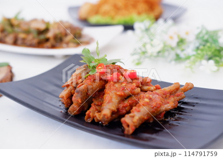 delicious spicy chicken feet as a background 114791759