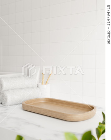 A space for showcasing products on a wooden tray on a white marble bathroom countertop. A space for showcasing products on a wooden tray on a white marble bathroom countertop. 114794718