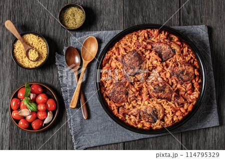 baked greek chicken orzo stew in tomato sauce baked greek chicken orzo stew in tomato sauce 114795329