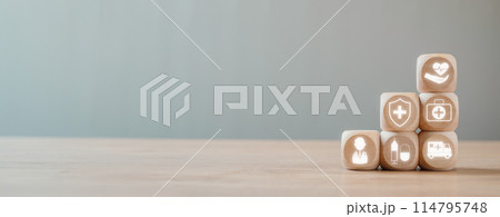 Heathcare concept, Wooden block on desk with heathcare icon on virtual screen. Heathcare concept, Wooden block on desk with heathcare icon on virtual screen. 114795748