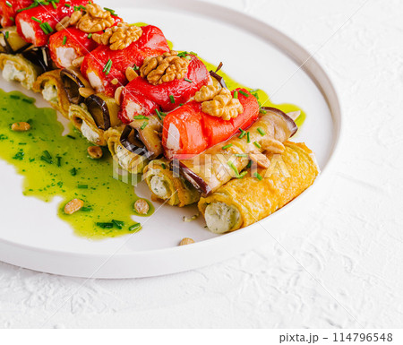 Gourmet stuffed chicken roll with vegetables and nuts Gourmet stuffed chicken roll with vegetables and nuts 114796548