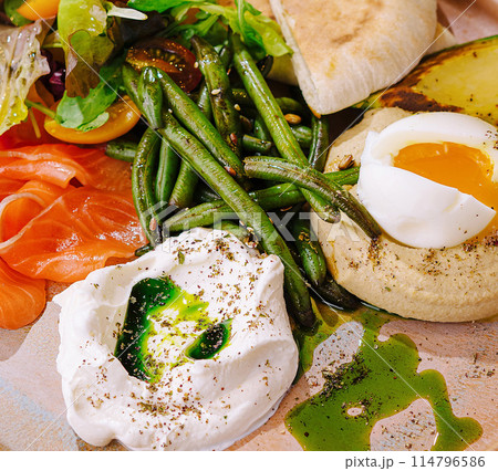 Gourmet breakfast platter with poached eggs and salmon Gourmet breakfast platter with poached eggs and salmon 114796586