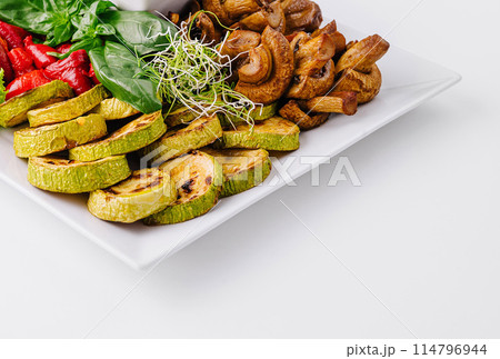 Fresh vegan meal assortment on white 114796944