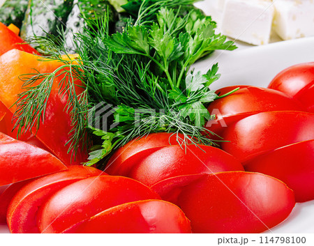 fresh chopped vegetables on a plate fresh chopped vegetables on a plate 114798100