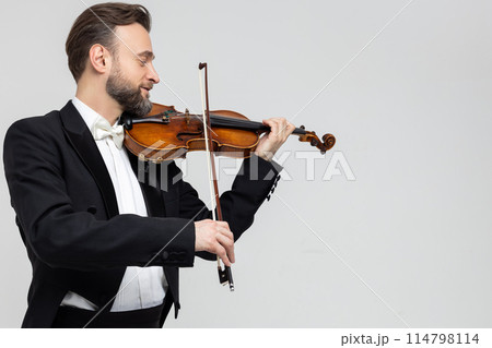 Classical musician playing violin 114798114