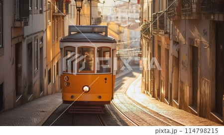 Romantic Lisbon street with the typical yellow tram and Lisbon Cathedral on the background 114798215