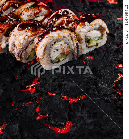Volcanic sushi concept on lava texture 114799412