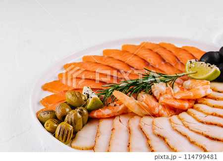 Assorted seafood platter with smoked salmon and shrimp Assorted seafood platter with smoked salmon and shrimp 114799481
