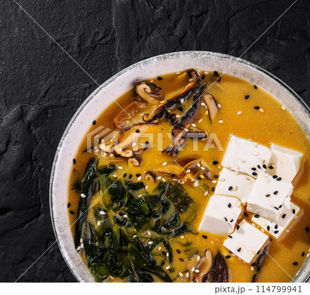 Homemade miso soup with tofu and seaweed Homemade miso soup with tofu and seaweed 114799941