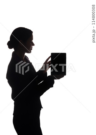 Young woman in suit shows pointer forward, side view - silhouette 114800308