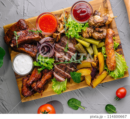 Assorted grilled meat and vegetable platter with sauces Assorted grilled meat and vegetable platter with sauces 114800667