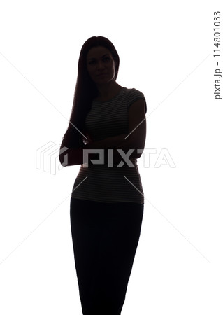 Young woman look ahead with flowing hair - vertical silhouette 114801033