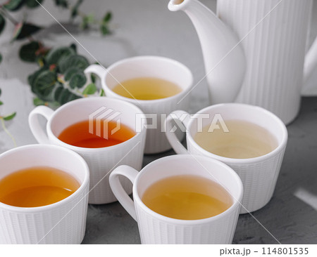 Variety of teas in white ceramic cups 114801535