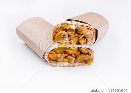 Fresh chicken shawarma wrap on white background Fresh chicken shawarma wrap on white background 114801695