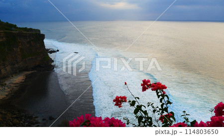 Turquoise ocean sea water white wave splashing deep blue sea. Bird eye view monster wave splash on rock. Tropical sea beach in summer seaside outdoor. Ocean island beautiful dramatic landscape. Turquoise ocean sea water white wave splashing deep blue sea. Bird eye view monster wave splash on rock. Tropical sea beach in summer seaside outdoor. Ocean island beautiful dramatic landscape. 114803650