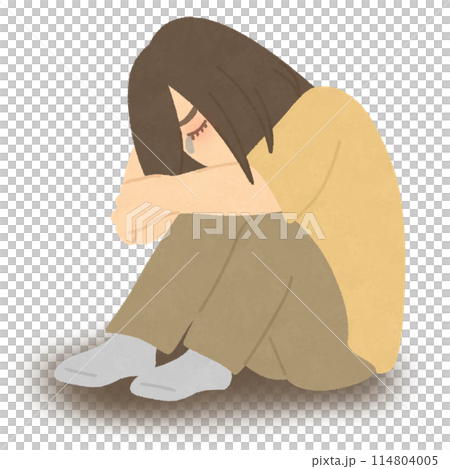 Sad woman holding her knees 114804005