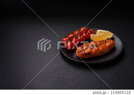 Fresh cooked delicious salmon steak with spices and herbs 114805118