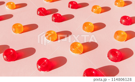 Sweet homemade marmalade on pink. Candy pattern background Sweet homemade marmalade on pink. Candy pattern background 114806128