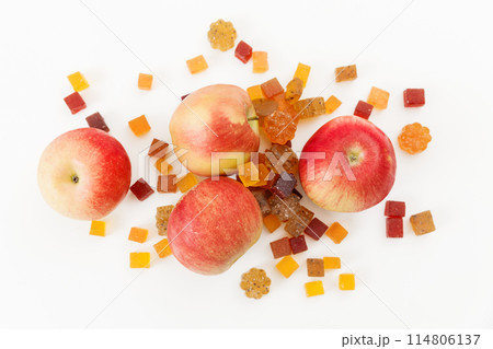 Homemade jelly with sweet apple fruits on white. Flat lay, top view Homemade jelly with sweet apple fruits on white. Flat lay, top view 114806137